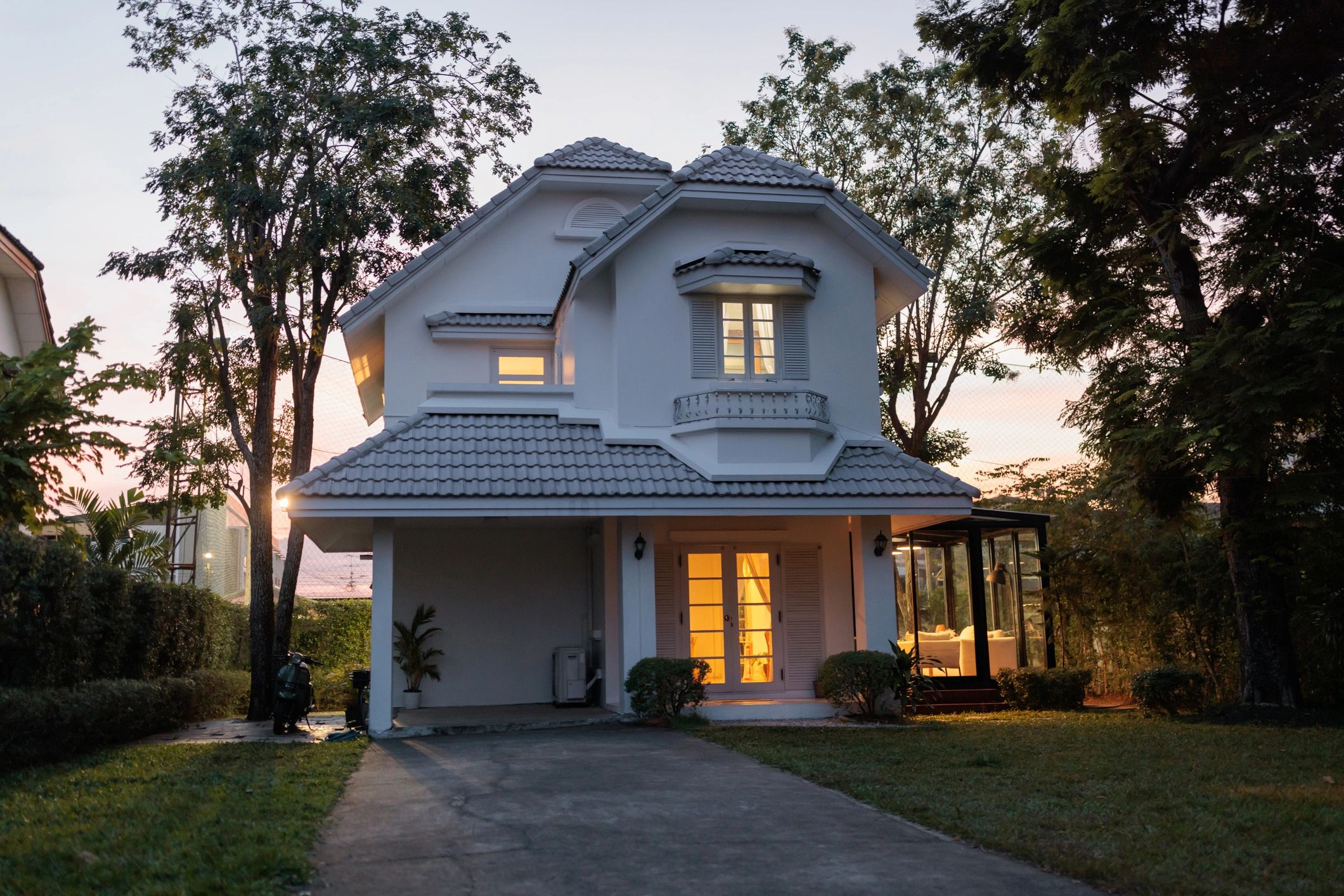 Warm inviting home exterior at dusk