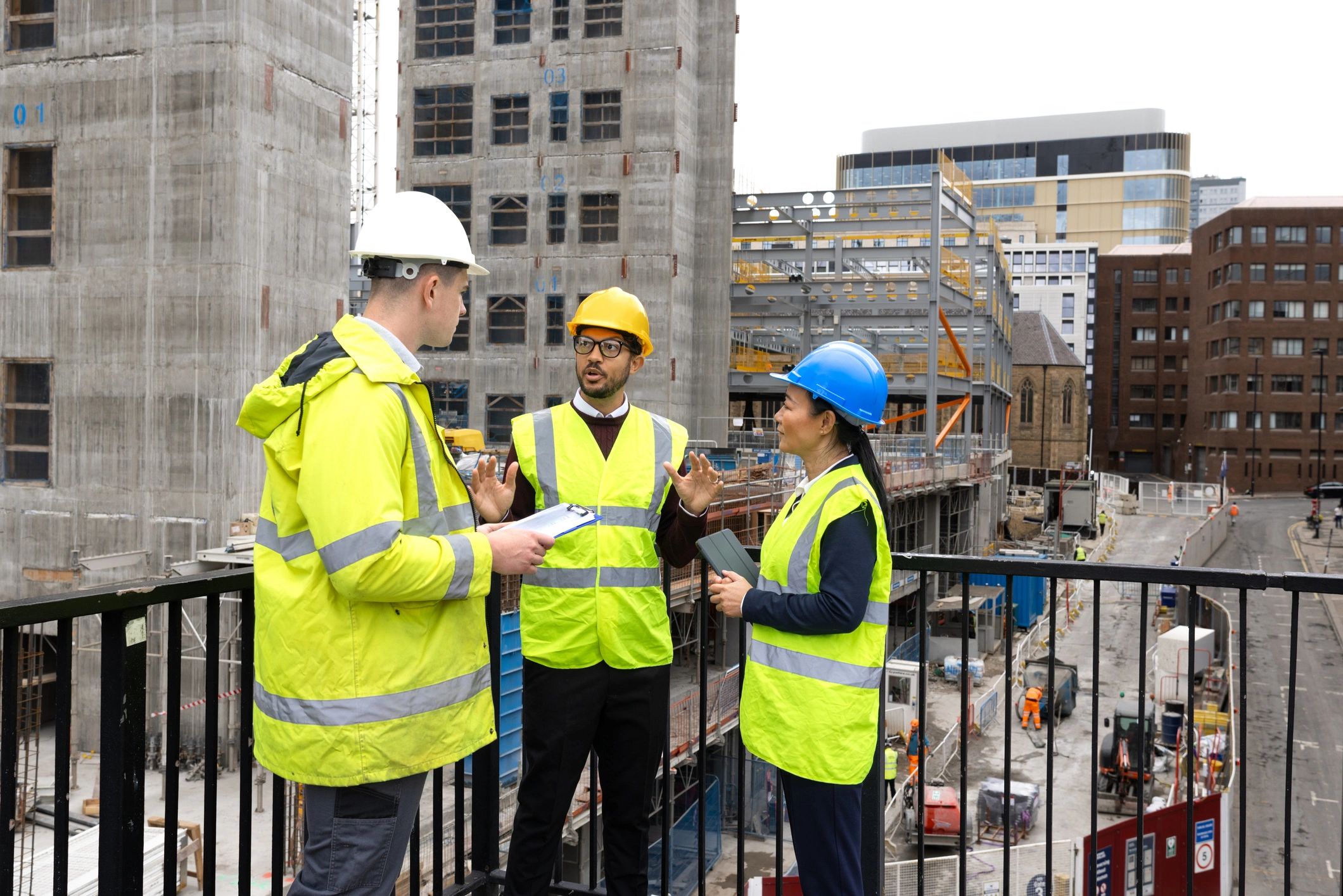 Construction professionals reviewing project plans